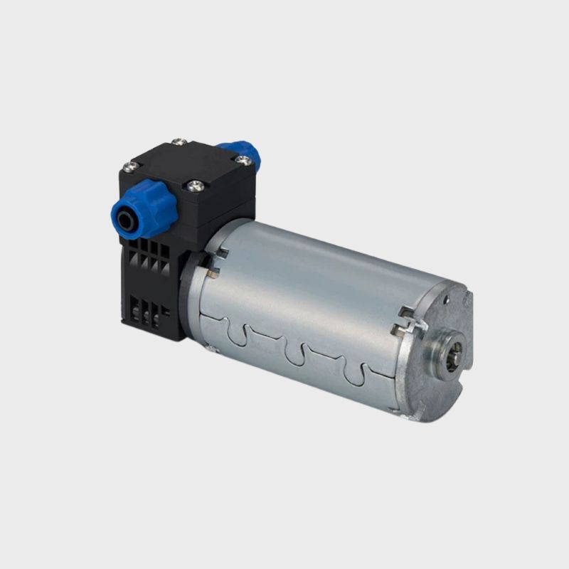 Compact diaphragm ink pump with brush motor for stable ink circulation.