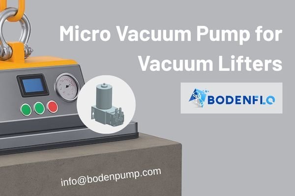 A robotic arm using a vacuum lifter with a micro vacuum pump to pick up a small object